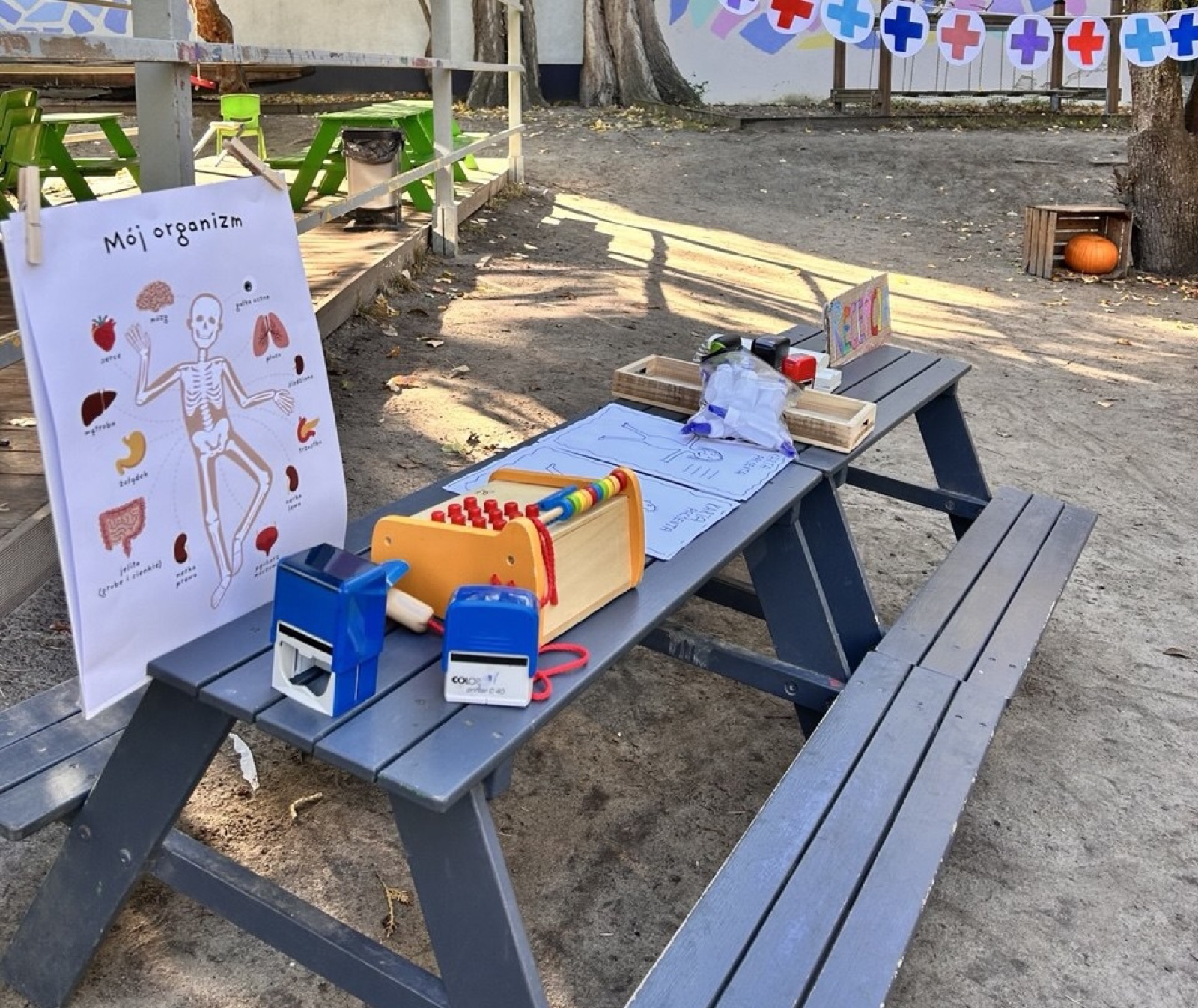 A table with activity materials in the garden
